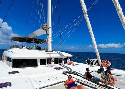 Guests on the Foredeck of Engima as we cruise St Maarten